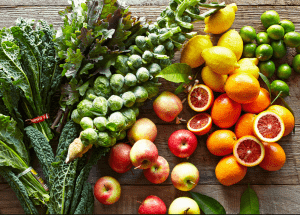 a group of fruits and vegetables on a wood surface Healthy Weight Loss Diets Worksop