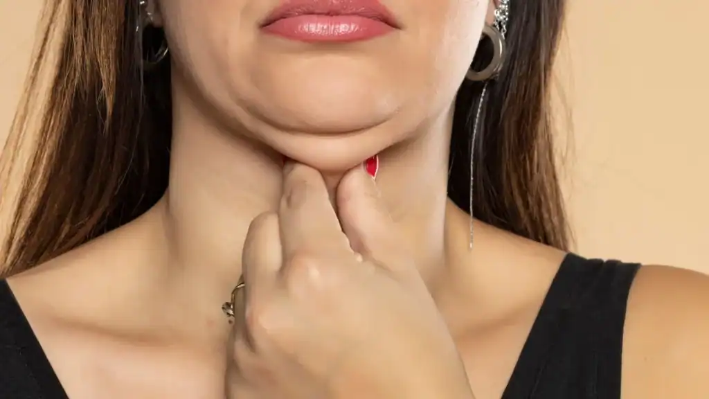 An image of a woman with double chin, sad, worried : Non Surgical Double Chin Removal Treatment in Worksop, UK